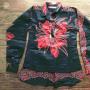 Blouse with a realiy large red flower on black background
