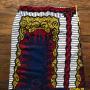 Skirt in light cotton textile and artistic pattern in white, marine blue, red. And a golden braid!