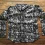 Shirt in brown and white, in a wild forest pattern