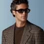 This mid brown checked blazer is cut to a relaxed fit — roomy through the chest and waist with a soft, natural shoulder — and features a notch lapel, patch pockets, and half-canvas construction.